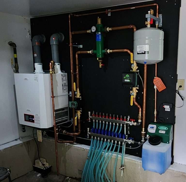 Hydronic boiler and radiant manifold in a custom home mechanical room
