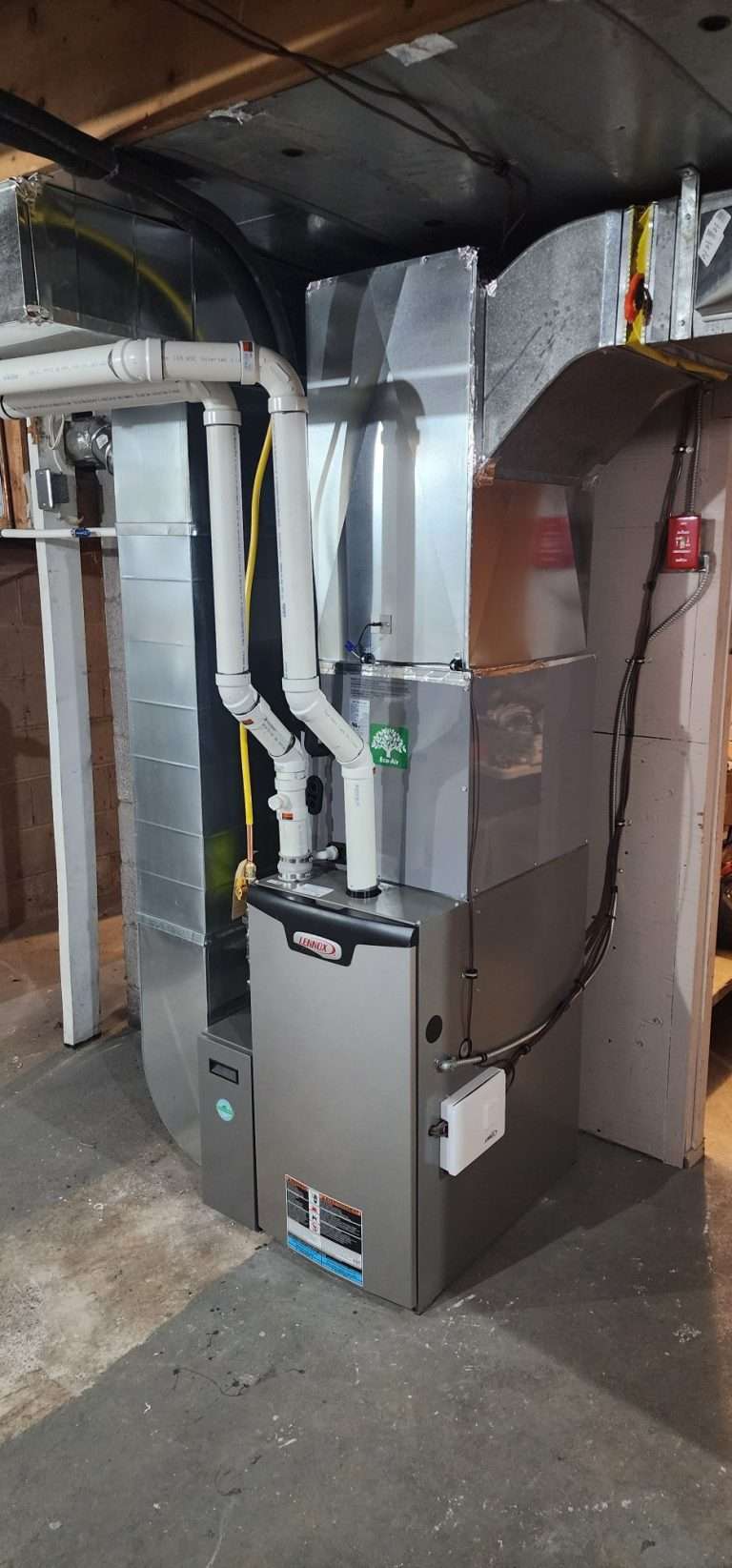 Custom sheet-metal ductwork in a new home mechanical room